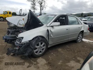 2000 Toyota Avalon XL with VIN 4T1BF28B4YU020969, listed as a Copart auction lot 51116915 with 117,924 mi miles and Salvage Title. Bid and sale history available at DreamBid. Image 1.