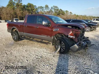 2016 Nissan Titan SL z VIN 1N6BA1F2XGN506885, wystawiony jako Copart lot #43457125 z przebiegiem 51 323 mil mil oraz Szkoda całkowita • Salvage title. Historia ofert i sprzedaży dostępna na DreamBid. Obrazek 4.