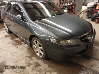 2005 Acura TSX with VIN JH4CL96975C034682, listed as a IAAI auction lot 41596405 with 228,889 mi miles. Bid and sale history available at carsss.com. Image 1.