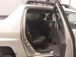 2014 Honda Ridgeline SE with VIN 5FPYK1F65EB006410, listed as a IAAI auction lot 41471886 with 92,406 mi miles. Bid and sale history available at carsss.com. Image 8.