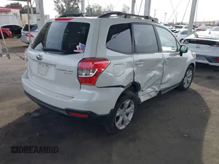 2015 Subaru Forester Premium with VIN JF2SJAFCXFH489984, listed as a IAAI auction lot 41082317 with 146,244 mi miles and . Bid and sale history available at DreamBid. Image 4.