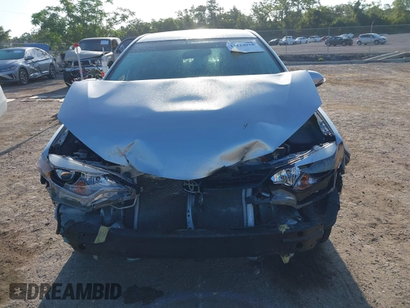 2014 Toyota Corolla L with VIN 2T1BURHE1EC081542, listed as a IAAI auction lot 42124018 with 94,099 mi miles and . Bid and sale history available at DreamBid. Image 12.