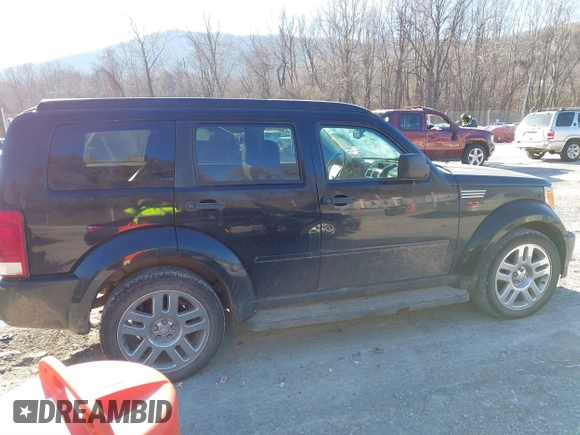 2007 Dodge Nitro SLT with VIN 1D8GU58K67W688374, listed as a IAAI auction lot 41392892 with 97,402 mi miles. Bid and sale history available at carsss.com. Image 13.