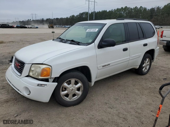 2004 GMC Envoy SLE with VIN 1GKDS13S042166838, listed as a Copart auction lot 43651635 with 165,326 mi miles and Salvage Title. Bid and sale history available at carsss.com. Image 1.