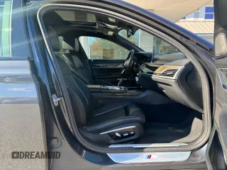 2016 BMW 7 Series 750i with VIN WBA7F0C53GGM20435, listed as a Copart auction lot 77656554 with 186,227 mi miles and Clean Title. Bid and sale history available at carsss.com. Image 5.