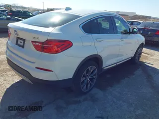 2016 BMW X4 xDrive28i z VIN 5UXXW3C59G0R19977, wystawiony jako IAAI lot #41840665 z przebiegiem 69 353 mil mil oraz . Historia ofert i sprzedaży dostępna na DreamBid. Obrazek 4.