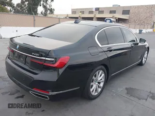 2022 BMW 7 Series 740i with VIN WBA7T2C0XNCJ31291, listed as a IAAI auction lot 40623307 with 98,877 mi miles. Bid and sale history available at carsss.com. Image 4.