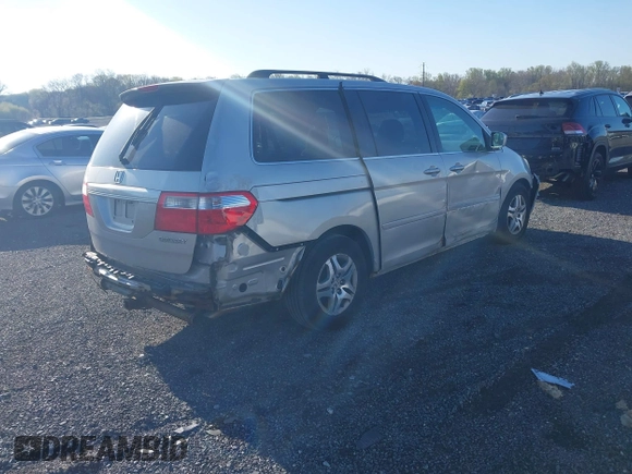 2005 Honda Odyssey EX with VIN 5FNRL38445B411188, listed as a IAAI auction lot 42060307 with 240,688 mi miles. Bid and sale history available at carsss.com. Image 4.