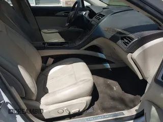 2014 Lincoln MKZ with VIN 3LN6L2G95ER827769, listed as a IAAI auction lot 42109075 with 154,000 mi miles. Bid and sale history available at carsss.com. Image 5.