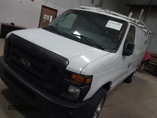 2009 Ford Econoline Cargo with VIN 1FTNE24L79DA86615, listed as a IAAI auction lot 41969289 with 158,267 mi miles and . Bid and sale history available at DreamBid. Image 2.