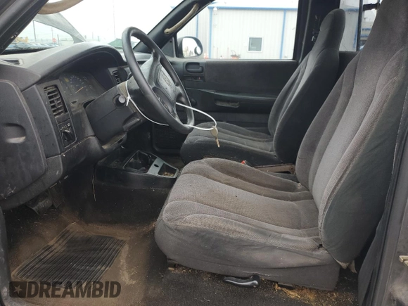 2002 Dodge Dakota с VIN 1B7FL46XX2S511526, выставлен на аукционе Copart как лот 57955594 с пробегом 244 367 миль миль и Списание • Salvage title. История ставок и продаж доступна на DreamBid. Изображение 7.