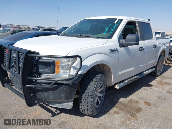 2018 Ford F-150 XL with VIN 1FTEW1E53JKE93841, listed as a IAAI auction lot 42256829 with 126,192 mi miles and . Bid and sale history available at DreamBid. Image 2.