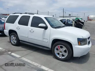 2011 Chevrolet Tahoe LT with VIN 1GNSCBE05BR237173, listed as a IAAI auction lot 42581670 with 143,516 mi miles and . Bid and sale history available at DreamBid. Image 1.