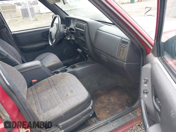 1999 Jeep Cherokee Sport with VIN 1J4FT68S1XL596443, listed as a IAAI auction lot 41767289 with 192,826 mi miles and . Bid and sale history available at DreamBid. Image 5.