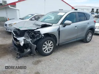 2013 Mazda CX-5 Touring with VIN JM3KE2CE3D0136911, listed as a IAAI auction lot 42095413 with 158,515 mi miles. Bid and sale history available at carsss.com. Image 2.