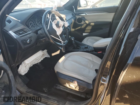 2016 BMW X1 xDrive28i with VIN WBXHT3C36GP880207, listed as a Copart auction lot 82597924 with 145,444 mi miles and Salvage Title. Bid and sale history available at carsss.com. Image 7.