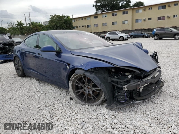 2023 Tesla Model S with VIN 5YJSA1E58PF498685, listed as a Copart auction lot 41690475 with Not provided miles and Salvage title. Bid and sale history available at DreamBid. Image 4.