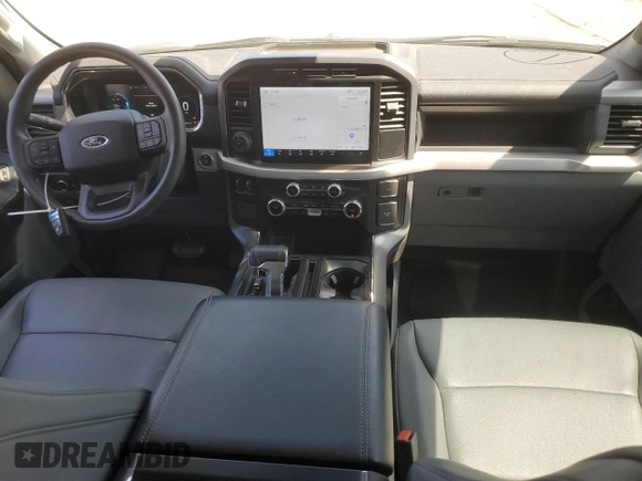 2023 Ford F-150 Lightning Pro with VIN 1FTVW1EL7PWG11261, listed as a Copart auction lot 64088925 with 3,288 mi miles and Salvage title. Bid and sale history available at DreamBid. Image 8.