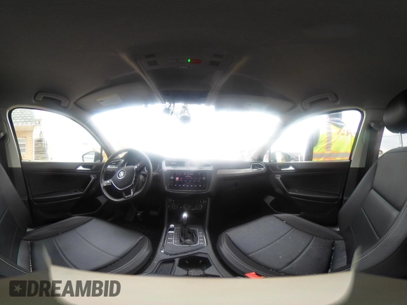 2021 Volkswagen Tiguan SE z VIN 3VV3B7AXXMM101773, wystawiony jako IAAI lot #42358588 z przebiegiem 105 629 mil mil oraz . Historia ofert i sprzedaży dostępna na DreamBid. Obrazek 19.