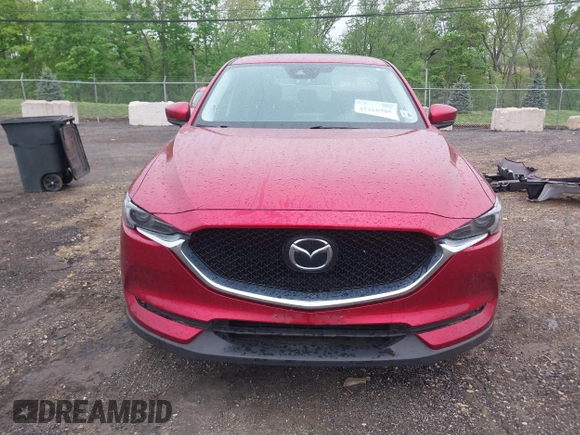2020 Mazda CX-5 Grand Touring with VIN JM3KFBDM7L1731837, listed as a IAAI auction lot 42160795 with 63,826 mi miles and . Bid and sale history available at DreamBid. Image 13.
