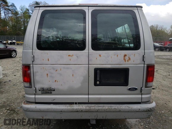 1999 Ford Econoline Passenger XL with VIN 1FBSS31LXXHA39417, listed as a Copart auction lot 52817645 with 109,930 mi miles and Salvage title. Bid and sale history available at DreamBid. Image 6.