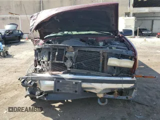 1998 GMC Suburban z VIN 3GKFK16R1WG503206, wystawiony jako Copart lot #69802344 z przebiegiem 231 148 mil mil oraz Szkody całkowita. Historia ofert i sprzedaży dostępna na DreamBid. Obrazek 5.