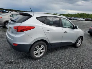 2013 Hyundai Tucson GLS with VIN KM8JU3AC1DU709937, listed as a Copart auction lot 52716295 with 181,711 mi miles and Salvage Title. Bid and sale history available at carsss.com. Image 3.