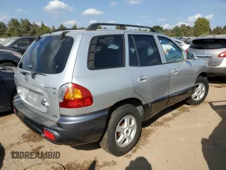2003 Hyundai Santa Fe GLS with VIN KM8SC73D13U392972, listed as a Copart auction lot 68801744 with 153,941 mi miles and Salvage Title. Bid and sale history available at carsss.com. Image 3.