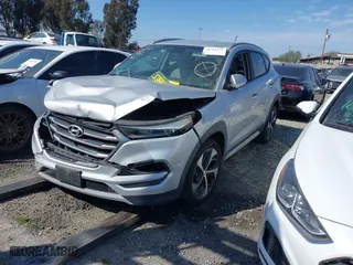 2017 Hyundai Tucson Value with VIN KM8J33A25HU468142, listed as a IAAI auction lot 41382131 with 1 mi miles. Bid and sale history available at carsss.com. Image 2.