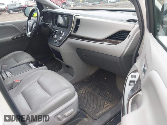 2015 Toyota Sienna Limited with VIN 5TDDK3DCXFS103594, listed as a IAAI auction lot 42515466 with 96,684 mi miles and . Bid and sale history available at DreamBid. Image 5.