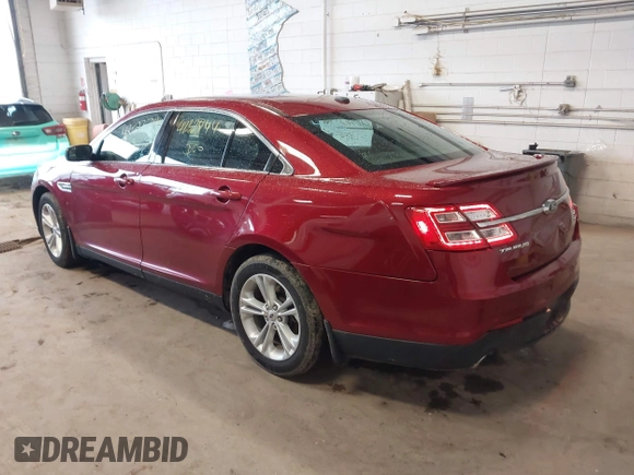 2015 Ford Taurus SEL with VIN 1FAHP2E82FG124009, listed as a IAAI auction lot 42323744 with 159,196 mi miles and . Bid and sale history available at DreamBid. Image 3.