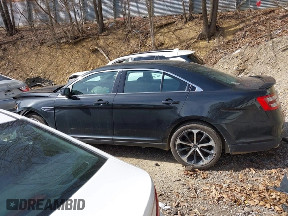 2014 Ford Taurus SHO with VIN 1FAHP2KT8EG131067, listed as a IAAI auction lot 42102086 with 107,822 mi miles. Bid and sale history available at carsss.com. Image 14.