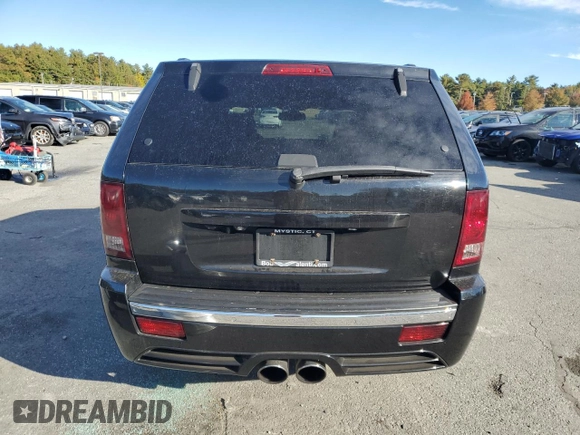 2008 Jeep Grand Cherokee SRT-8 with VIN 1J8HR78368C152318, listed as a Copart auction lot 74203604 with 157,840 mi miles and Salvage Title. Bid and sale history available at carsss.com. Image 6.