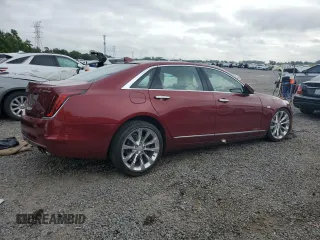2017 Cadillac CT6 Platinum AWD z VIN 1G6KN5R60HU173474, wystawiony jako Copart lot #51207715 z przebiegiem 43 627 mil mil oraz Szkody całkowita. Historia ofert i sprzedaży dostępna na DreamBid. Obrazek 3.