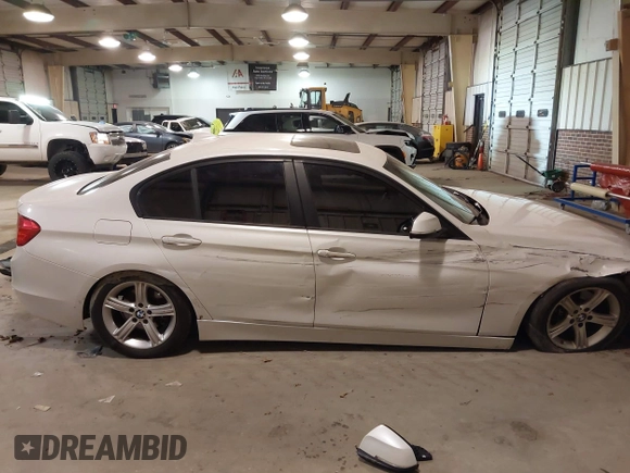 2014 BMW 3 Series 328d with VIN WBA3D3C57EK156586, listed as a IAAI auction lot 41328159 with 233,080 mi miles and . Bid and sale history available at DreamBid. Image 13.