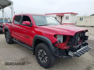2022 Toyota Tacoma SR with VIN 3TMCZ5AN3NM530056, listed as a IAAI auction lot 42106701 with 32,817 mi miles and . Bid and sale history available at DreamBid. Image 1.