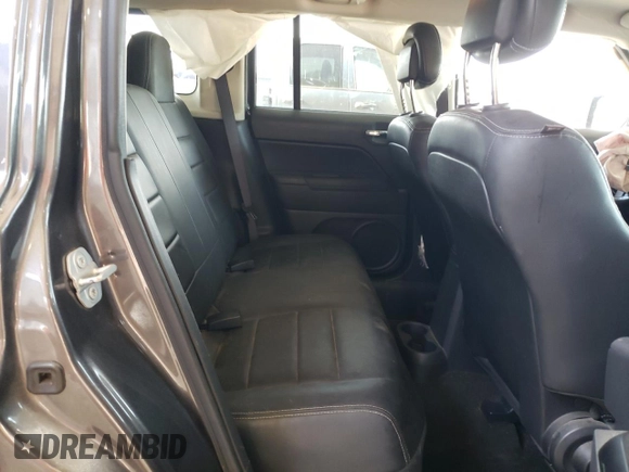 2016 Jeep Patriot Latitude z VIN 1C4NJPFA5GD699012, wystawiony jako Copart lot #55555095 z przebiegiem 82 643 mil mil oraz Szkoda całkowita • Salvage title. Historia ofert i sprzedaży dostępna na DreamBid. Obrazek 11.