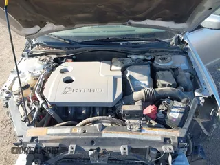 2012 Ford Fusion Hybrid with VIN 3FADP0L36CR289592, listed as a IAAI auction lot 41911406 with 174,977 mi miles and . Bid and sale history available at DreamBid. Image 10.
