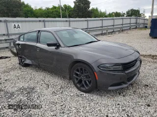 2019 Dodge Charger SXT with VIN 2C3CDXBGXKH734703, listed as a Copart auction lot 54206805 with 61,810 mi miles and Salvage Title. Bid and sale history available at DreamBid. Image 4.