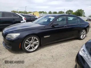 2012 BMW 7 Series 740Li with VIN WBAKB4C5XCC576227, listed as a Copart auction lot 52946135 with 154,611 mi miles and Salvage Title. Bid and sale history available at carsss.com. Image 1.
