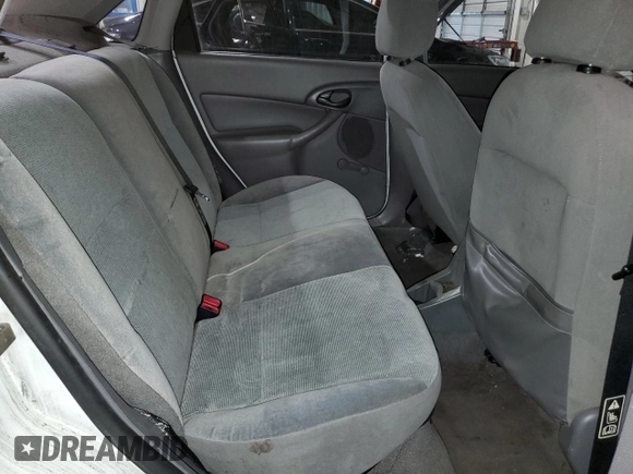 2002 Ford Focus LX with VIN 1FAFP33P52W126344, listed as a Copart auction lot 49757324 with 140,612 mi miles and Salvage Title. Bid and sale history available at DreamBid. Image 11.