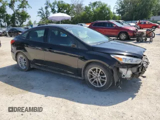 2018 Ford Focus SE z VIN 1FADP3FEXJL256542, wystawiony jako Copart lot #54583915 z przebiegiem 107 774 mil mil oraz Szkoda całkowita • Salvage title. Historia ofert i sprzedaży dostępna na DreamBid. Obrazek 4.