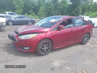 2015 Ford Focus SE z VIN 1FADP3F25FL313033, wystawiony jako IAAI lot #42206507 z przebiegiem 142 938 mil mil oraz . Historia ofert i sprzedaży dostępna na DreamBid. Obrazek 2.