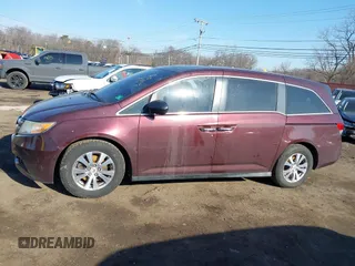 2014 Honda Odyssey EX-L with VIN 5FNRL5H60EB009083, listed as a IAAI auction lot 41633419 with 219,930 mi miles and . Bid and sale history available at carsss.com. Image 14.