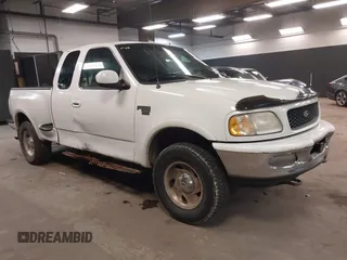 1998 Ford F-150 z VIN 2FTZX08W9WCA27422, wystawiony jako IAAI lot #42391383 z przebiegiem 183 526 mil mil oraz . Historia ofert i sprzedaży dostępna na DreamBid. Obrazek 1.