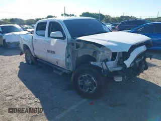 2023 Toyota Tacoma SR with VIN 3TMCZ5AN2PM649123, listed as a IAAI auction lot 41687819 with 44,383 mi miles and . Bid and sale history available at DreamBid. Image 1.