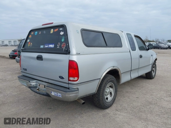 1999 Ford F-150 with VIN 1FTZX1720XKA10512, listed as a IAAI auction lot 41247083 with 169,154 mi miles and . Bid and sale history available at DreamBid. Image 4.