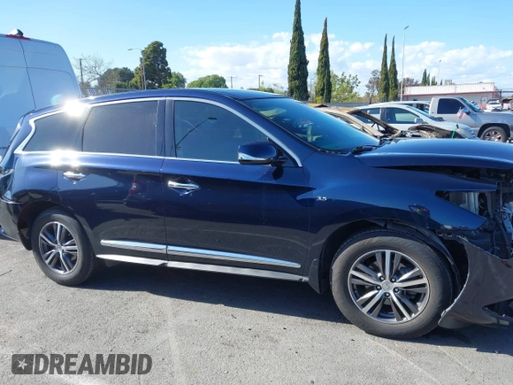 2019 Infiniti QX60 LUXE with VIN 5N1DL0MN9KC559199, listed as a IAAI auction lot 41931773 with 111,569 mi miles. Bid and sale history available at carsss.com. Image 14.