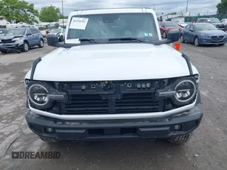 2024 Ford Bronco Big Bend with VIN 1FMDE7BH6RLB22321, listed as a IAAI auction lot 42355352 with 7,448 mi miles and . Bid and sale history available at DreamBid. Image 6.