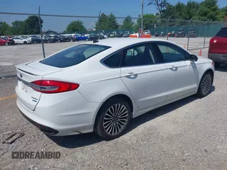 2018 Ford Fusion Titanium with VIN 3FA6P0D98JR134230, listed as a IAAI auction lot 42567084 with 107,459 mi miles and . Bid and sale history available at DreamBid. Image 4.